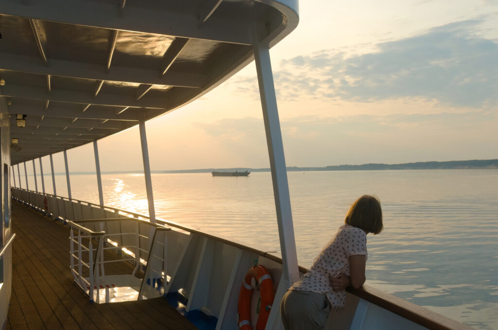 Women and the sunset on the river